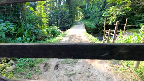 Approaching-a-rural-wooden-gate