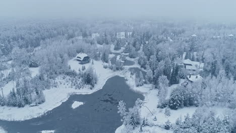 Countryside-Landscape-Covered-In-Thick-Snow-During-Winter---aerial-drone-shot