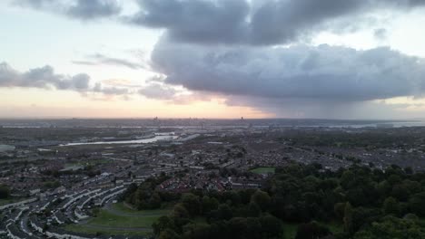 Bidston-Hill-towards-Liverpool-at-dawn,-aerial-drone-quick-timelapse
