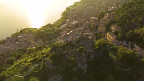 Aerial-Pullback-Reveals-Historic-Orsinis-Fortress-in-Trevignano-at-Sunset