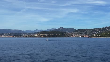 Sailboat-sailing-offshore-along-coast-of-Nice-in-France