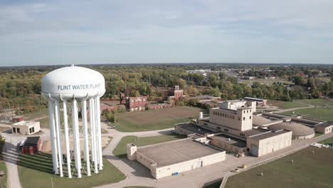 Flint,-Michigan-water-tower-and-treatment-plant-with-drone-video-moving-forward