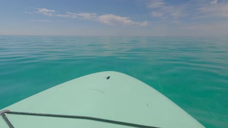 Paddle-board-floating-off-the-coast-of-Miramar-Beach-Florida-in-the-Gulf-of-Mexico
