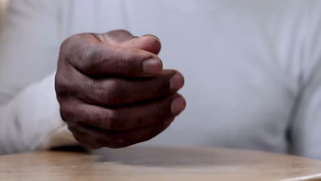 man-praying-to-god-with-hands-together-Caribbean-man-praying-with-white-background-stock-footage