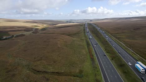 Aerial-footage-of-the-M62-Motorway-at-its-Summit,-Highest-motorway-in-England,-Yorkshire