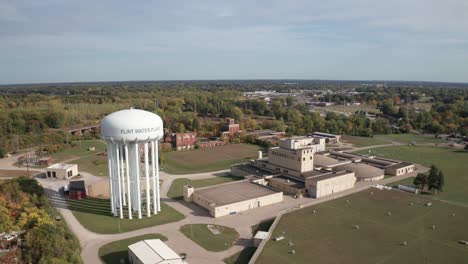 Flint,-Michigan-water-tower-and-treatment-plant-wide-shot-drone-video-moving-down
