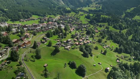 Wide-angle-aerial-view-over-Wengen,-Switzerland