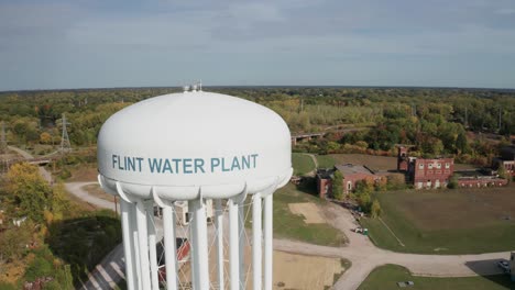 Flint,-Michigan-water-tower-close-up-drone-video-moving-sideways