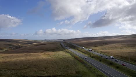 Aerial-drone-footage-of-the-M62-Motorway-at-its-Summit,-the-highest-motorway-in-England