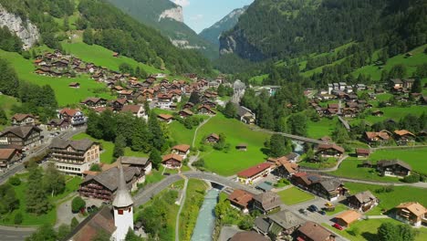 Aerial-view-of-the-Lauterbrunnen-valley-and-Kirche-church,-Switzerland