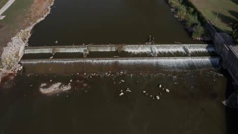 Flint-River-and-dam-in-Flint,-Michigan-with-drone-video-moving-over