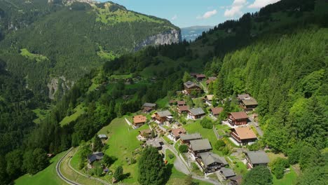Aerial-view-of-mountain-side-housing-in-Wengen,-Switzerland