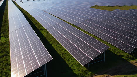 Solar-panel-installation-on-large-field-countryside-in-north-Poland---Right-moving-closeup-of-panels