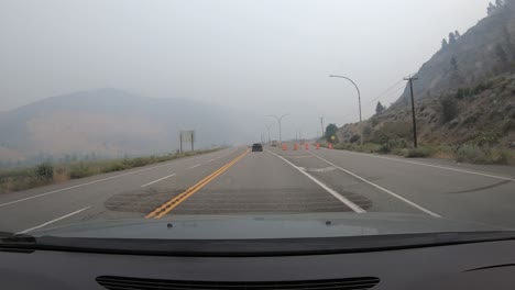 Hyperlapse-Driving-on-a-Misty-Mountain-Road,-Driver's-Point-of-View