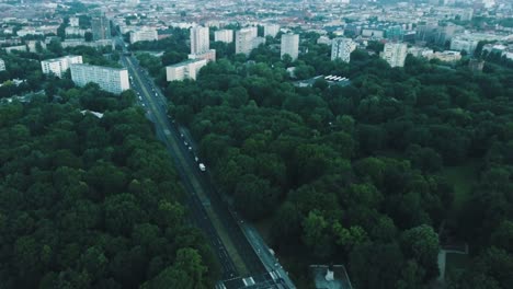Drone-aerial-following-road-with-trees-to-reveal-Berlin-Victory-Column