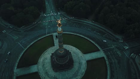 Drone-aerial-of-Berlin-Victory-Column-rise-and-turn-right-before-sunrise-moody-shot