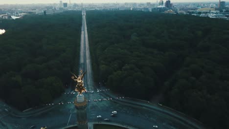 Drone-aerial-rise-and-pan-down-over-Berlin-Victory-Column-during-sunrise