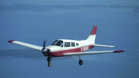 Light-Aircraft-Formation-Flying,-Piper-Cherokee-Frontal-View-in-Flight