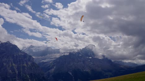Paragliders-gliding-around-the-Swiss-Alps