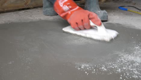 Floating-Concrete-by-Hand-with-White-Styrofoam-Trowel-Close-Up
