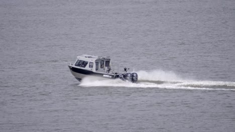 Powerboat-Speeding-Across-Tranquil-Ocean.-Tracking-Shot