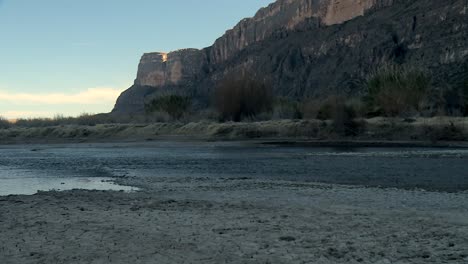 River-Flowing-In-Big-Bend-National-Park-Canyon-Cliff-Landscape-At-Dusk
