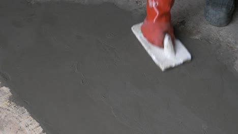 Smoothing-Concrete-with-White-Styrofoam-Trowel