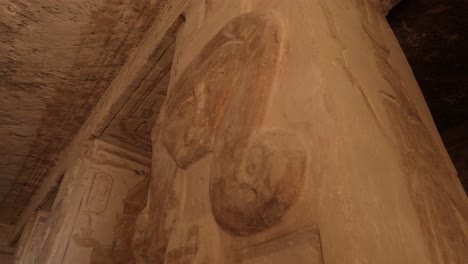 Carved-walls-inside-the-temple-Abu-Simbel,-ancient-civilization-of-Egypt,-painted-walls-in-tomb