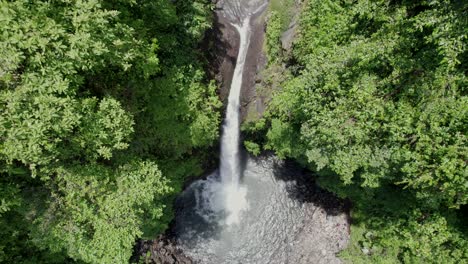 view-of-a-waterfall-during-midday-from-above