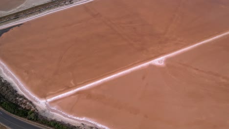Aerial-Flying-Towards-Large-Salt-Fields-In-Sardinia