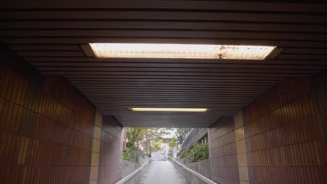 POV-walk-through-pedestrian-underpass-in-Cologne,-Germany