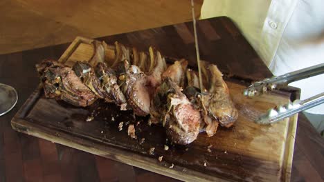 Rack-of-lamb-resting-on-chopping-board