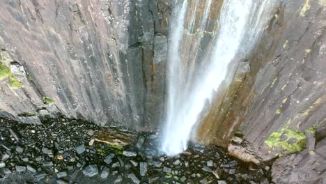 Aerial-flyover-the-Mealtfalls-Waterfall-in-the-Highlands,-Isle-of-Skye-Coast