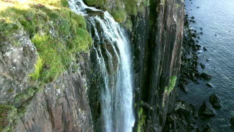 Slow-tilt-down-showing-the-stunning-Mealtfall-Waterfall-at-the-Isle-of-Skye