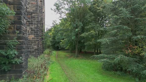 Drone-footage-at-the-foot-of-Penistone-Viaduct-near-Barnsley,-South-Yorkshire,-UK