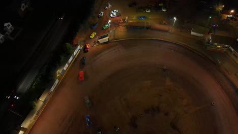 Racecars-line-up-to-leave-oval-dirt-track-after-a-race---Oval-dirt-track