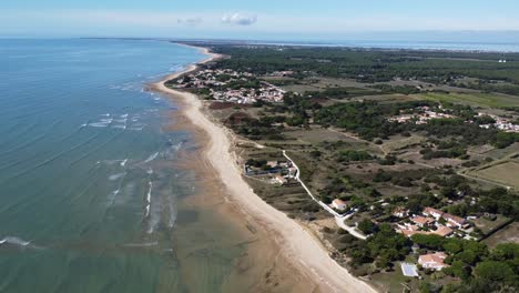 View-over-the-whole-island-of-Ré,-from-Sainte-Marie-De-Ré,-filmed-with-the-drone,-sunny-weather