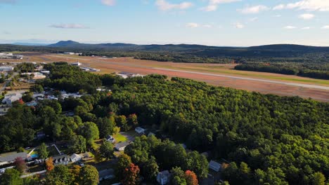 A-drone-shot-of-a-private-airport-in-New-England-during-the-fall-time