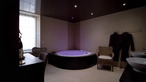 Bathroom-with-its-illuminated-jaccuzi-bath
