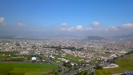 View-towards-Mexico-city-from-the-town-of-chalco-in-a-clear-day-and-a-view-of-the-pollution-of-the-city-from-afar