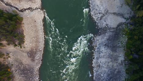 A-top-down-aerial-drone-shot-of-the-Fraser-River-in-the-interior-of-British-Columbia