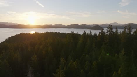 The-British-Columbia-coast,-forest-ocean-and-mountains-at-sunset