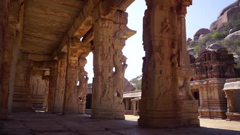 Ancient-Ganesha-temple-pillar-carvings,-Hampi,-India