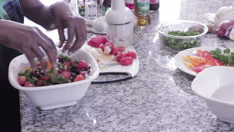 Mixing-salad-together-with-hands