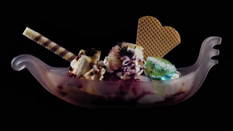 An-Ice-Cream-Cup-looking-like-a-Ship,-with-different-fruits
