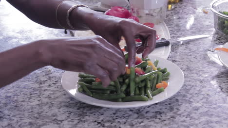 Cutting-vegetables-and-preparing-raw-bean-salad
