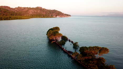 Aerial-footage-flying-over-SS-Adelaide-shipwreck-at-sunset-on-Magnetic-Island-in-Queensland-Australia