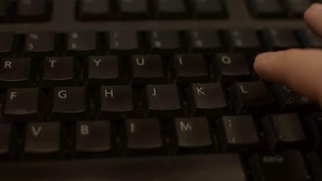 Typing-HELLO-on-a-dark-keyboard
