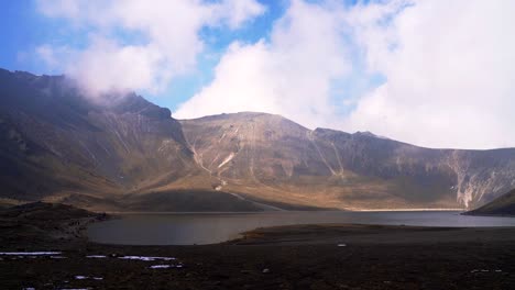Panoramic-view-of-the-moon-lagoon-in-nevado-de-toluca-crater-at-sunset-with-a-nice-view-of-the-shadows-and-a-little-bit-of-snow