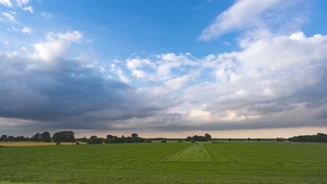 Green-fields,-blue-skies,-and-white-clouds